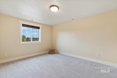 Discover this charming two-story home in South Nampa, offering 3 on Hunters Point Golf Club in Idaho - for sale on GolfHomes.com, golf home, golf lot