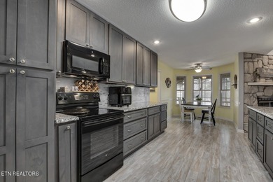 Beautifully updated ranch-style home located in the Toqua on Toqua Golf Course - Loudon County in Tennessee - for sale on GolfHomes.com, golf home, golf lot