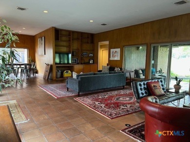 Welcome to your dream home-an exquisite mid-century modern on Victoria Country Club in Texas - for sale on GolfHomes.com, golf home, golf lot
