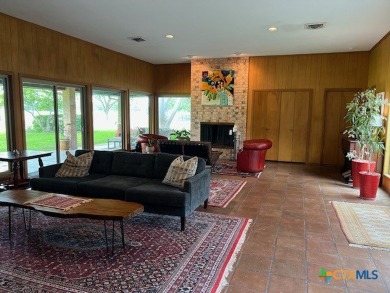 Welcome to your dream home-an exquisite mid-century modern on Victoria Country Club in Texas - for sale on GolfHomes.com, golf home, golf lot