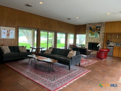 Welcome to your dream home-an exquisite mid-century modern on Victoria Country Club in Texas - for sale on GolfHomes.com, golf home, golf lot