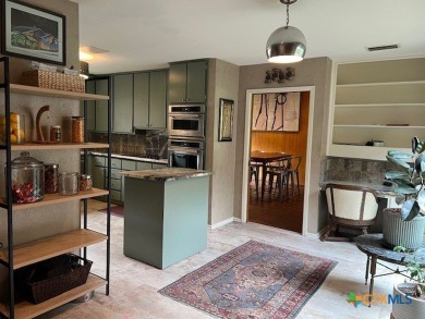 Welcome to your dream home-an exquisite mid-century modern on Victoria Country Club in Texas - for sale on GolfHomes.com, golf home, golf lot