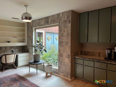 Welcome to your dream home-an exquisite mid-century modern on Victoria Country Club in Texas - for sale on GolfHomes.com, golf home, golf lot
