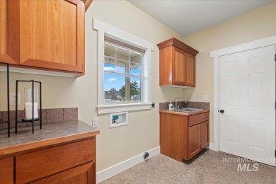 Discover this charming two-story home in South Nampa, offering 3 on Hunters Point Golf Club in Idaho - for sale on GolfHomes.com, golf home, golf lot