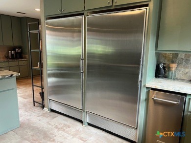 Welcome to your dream home-an exquisite mid-century modern on Victoria Country Club in Texas - for sale on GolfHomes.com, golf home, golf lot