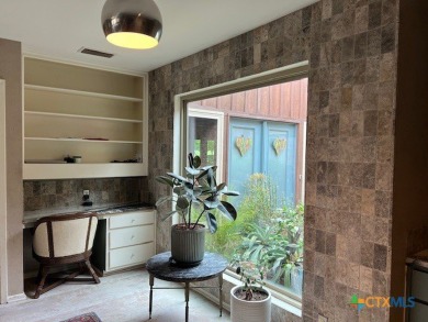 Welcome to your dream home-an exquisite mid-century modern on Victoria Country Club in Texas - for sale on GolfHomes.com, golf home, golf lot