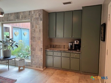 Welcome to your dream home-an exquisite mid-century modern on Victoria Country Club in Texas - for sale on GolfHomes.com, golf home, golf lot