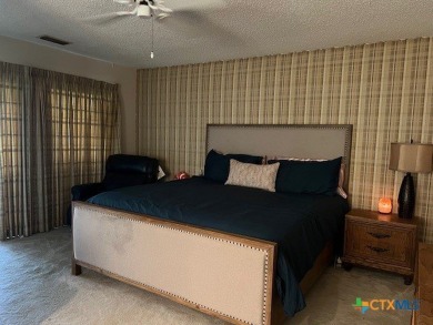 Welcome to your dream home-an exquisite mid-century modern on Victoria Country Club in Texas - for sale on GolfHomes.com, golf home, golf lot