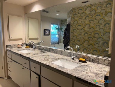 Welcome to your dream home-an exquisite mid-century modern on Victoria Country Club in Texas - for sale on GolfHomes.com, golf home, golf lot
