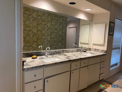Welcome to your dream home-an exquisite mid-century modern on Victoria Country Club in Texas - for sale on GolfHomes.com, golf home, golf lot