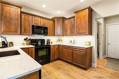 Discover luxury living in this stunning 3-bedroom, 3-bath on The Club At Porto Cima in Missouri - for sale on GolfHomes.com, golf home, golf lot