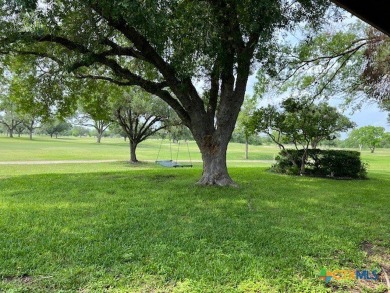 Welcome to your dream home-an exquisite mid-century modern on Victoria Country Club in Texas - for sale on GolfHomes.com, golf home, golf lot