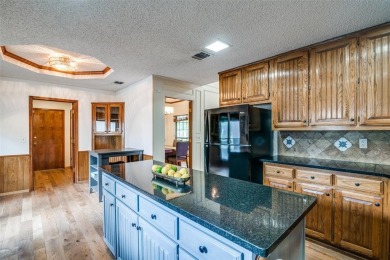 Tucked away on a peaceful cul-de-sac, this charming 3-bedroom on Sherrill Park Golf Course in Texas - for sale on GolfHomes.com, golf home, golf lot