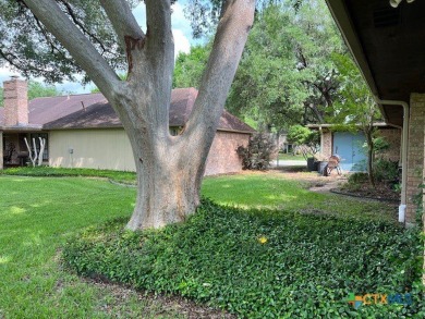 Welcome to your dream home-an exquisite mid-century modern on Victoria Country Club in Texas - for sale on GolfHomes.com, golf home, golf lot