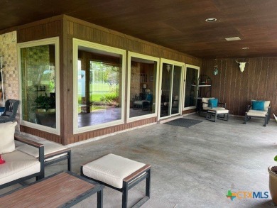 Welcome to your dream home-an exquisite mid-century modern on Victoria Country Club in Texas - for sale on GolfHomes.com, golf home, golf lot