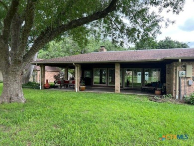 Welcome to your dream home-an exquisite mid-century modern on Victoria Country Club in Texas - for sale on GolfHomes.com, golf home, golf lot