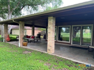Welcome to your dream home-an exquisite mid-century modern on Victoria Country Club in Texas - for sale on GolfHomes.com, golf home, golf lot
