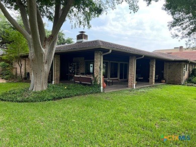 Welcome to your dream home-an exquisite mid-century modern on Victoria Country Club in Texas - for sale on GolfHomes.com, golf home, golf lot