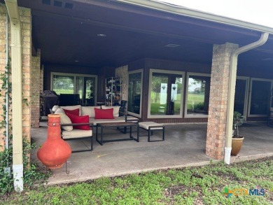Welcome to your dream home-an exquisite mid-century modern on Victoria Country Club in Texas - for sale on GolfHomes.com, golf home, golf lot