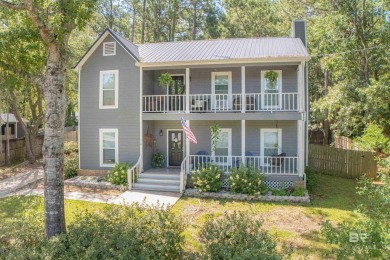 New Orleans-style two-story home located on a quiet street in on Lake Forest Yacht and Country Club in Alabama - for sale on GolfHomes.com, golf home, golf lot