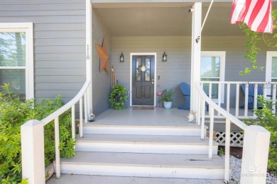 New Orleans-style two-story home located on a quiet street in on Lake Forest Yacht and Country Club in Alabama - for sale on GolfHomes.com, golf home, golf lot