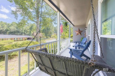 New Orleans-style two-story home located on a quiet street in on Lake Forest Yacht and Country Club in Alabama - for sale on GolfHomes.com, golf home, golf lot