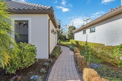 Live the resort lifestyle every day in this beautifully on Esplanade Golf and Country at Lakewood Ranch in Florida - for sale on GolfHomes.com, golf home, golf lot