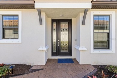 Live the resort lifestyle every day in this beautifully on Esplanade Golf and Country at Lakewood Ranch in Florida - for sale on GolfHomes.com, golf home, golf lot