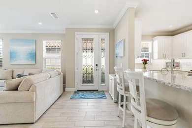 Live the resort lifestyle every day in this beautifully on Esplanade Golf and Country at Lakewood Ranch in Florida - for sale on GolfHomes.com, golf home, golf lot