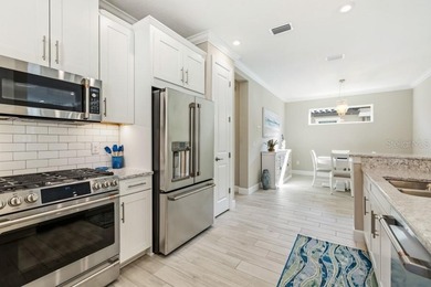 Live the resort lifestyle every day in this beautifully on Esplanade Golf and Country at Lakewood Ranch in Florida - for sale on GolfHomes.com, golf home, golf lot