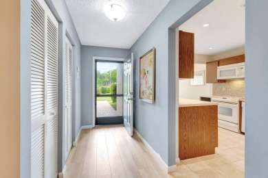 Welcome to this FRESHLY PAINTED  spacious first-floor retreat at on Hunters Run Golf and Country Club in Florida - for sale on GolfHomes.com, golf home, golf lot