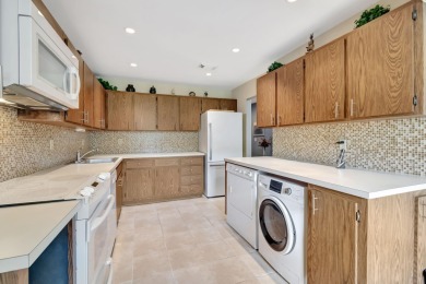 Welcome to this FRESHLY PAINTED  spacious first-floor retreat at on Hunters Run Golf and Country Club in Florida - for sale on GolfHomes.com, golf home, golf lot
