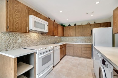 Welcome to this FRESHLY PAINTED  spacious first-floor retreat at on Hunters Run Golf and Country Club in Florida - for sale on GolfHomes.com, golf home, golf lot