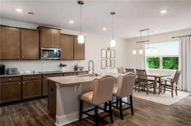 This amazing home with beautiful mountain views is nestled in a on The Highlands Course at Lake Arrowhead in Georgia - for sale on GolfHomes.com, golf home, golf lot
