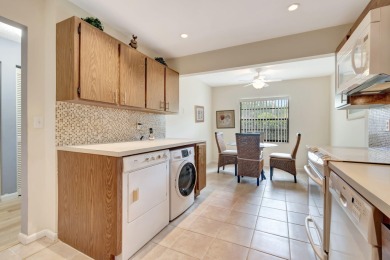 Welcome to this FRESHLY PAINTED  spacious first-floor retreat at on Hunters Run Golf and Country Club in Florida - for sale on GolfHomes.com, golf home, golf lot