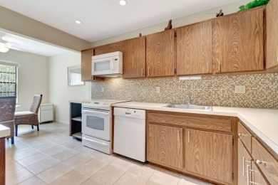 Welcome to this FRESHLY PAINTED  spacious first-floor retreat at on Hunters Run Golf and Country Club in Florida - for sale on GolfHomes.com, golf home, golf lot