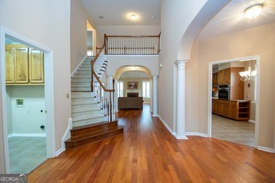 Welcome to this gorgeous brick Traditional with fabulous golf on Braelinn Golf Club in Georgia - for sale on GolfHomes.com, golf home, golf lot