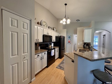 This duplex located on fairway 15 at the Macomb Country Club on Macomb Country Club in Illinois - for sale on GolfHomes.com, golf home, golf lot