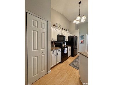 This duplex located on fairway 15 at the Macomb Country Club on Macomb Country Club in Illinois - for sale on GolfHomes.com, golf home, golf lot