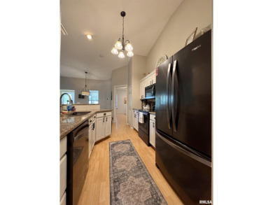This duplex located on fairway 15 at the Macomb Country Club on Macomb Country Club in Illinois - for sale on GolfHomes.com, golf home, golf lot