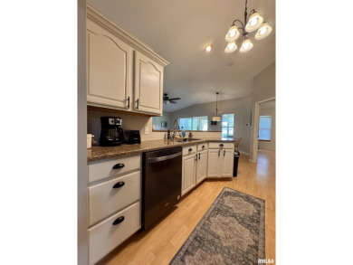 This duplex located on fairway 15 at the Macomb Country Club on Macomb Country Club in Illinois - for sale on GolfHomes.com, golf home, golf lot