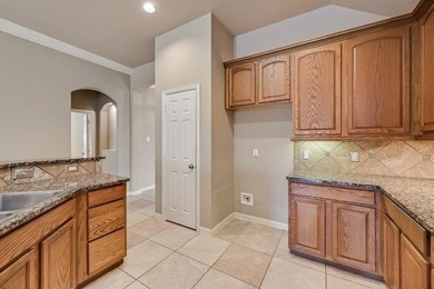 Located in the beautiful 24-hour guard-gated community of on Heritage Lakes - Par 3 - 9 Hole Course in Texas - for sale on GolfHomes.com, golf home, golf lot