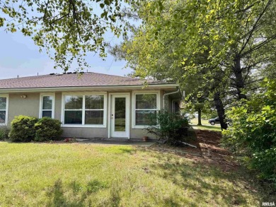 This duplex located on fairway 15 at the Macomb Country Club on Macomb Country Club in Illinois - for sale on GolfHomes.com, golf home, golf lot