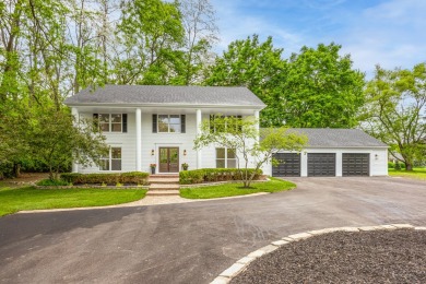 Experience the perfect blend of classic architecture and modern on Lake Barrington Shores Golf Course in Illinois - for sale on GolfHomes.com, golf home, golf lot
