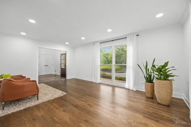 Experience the perfect blend of classic architecture and modern on Lake Barrington Shores Golf Course in Illinois - for sale on GolfHomes.com, golf home, golf lot