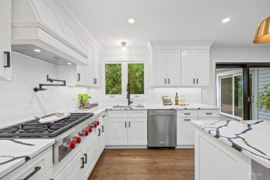 Experience the perfect blend of classic architecture and modern on Lake Barrington Shores Golf Course in Illinois - for sale on GolfHomes.com, golf home, golf lot