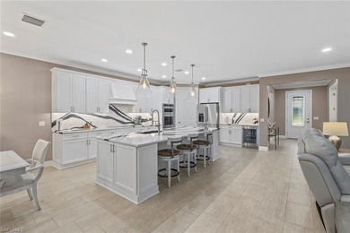 Experience true FLORIDA LUXURY LIVING with a LARGE SALTWATER on Panther Run Golf Club in Florida - for sale on GolfHomes.com, golf home, golf lot