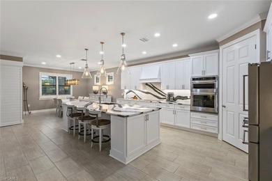 Experience true FLORIDA LUXURY LIVING with a LARGE SALTWATER on Panther Run Golf Club in Florida - for sale on GolfHomes.com, golf home, golf lot