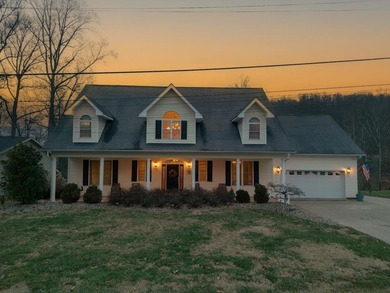 You're invited to experience a home where elegance feels on The Esquire Country Club in West Virginia - for sale on GolfHomes.com, golf home, golf lot