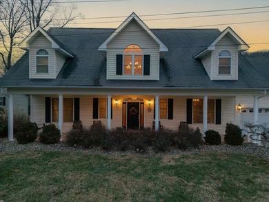 You're invited to experience a home where elegance feels on The Esquire Country Club in West Virginia - for sale on GolfHomes.com, golf home, golf lot